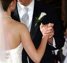 Bride and groom dancing together for the first dance 