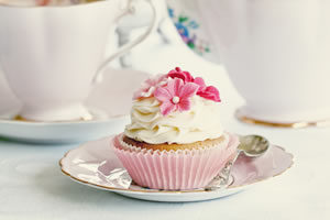 Pink Velvet Cupcake with Spoon on Plate