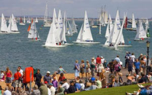 Sailing Race at Cowes Week with Spectators on the Shore